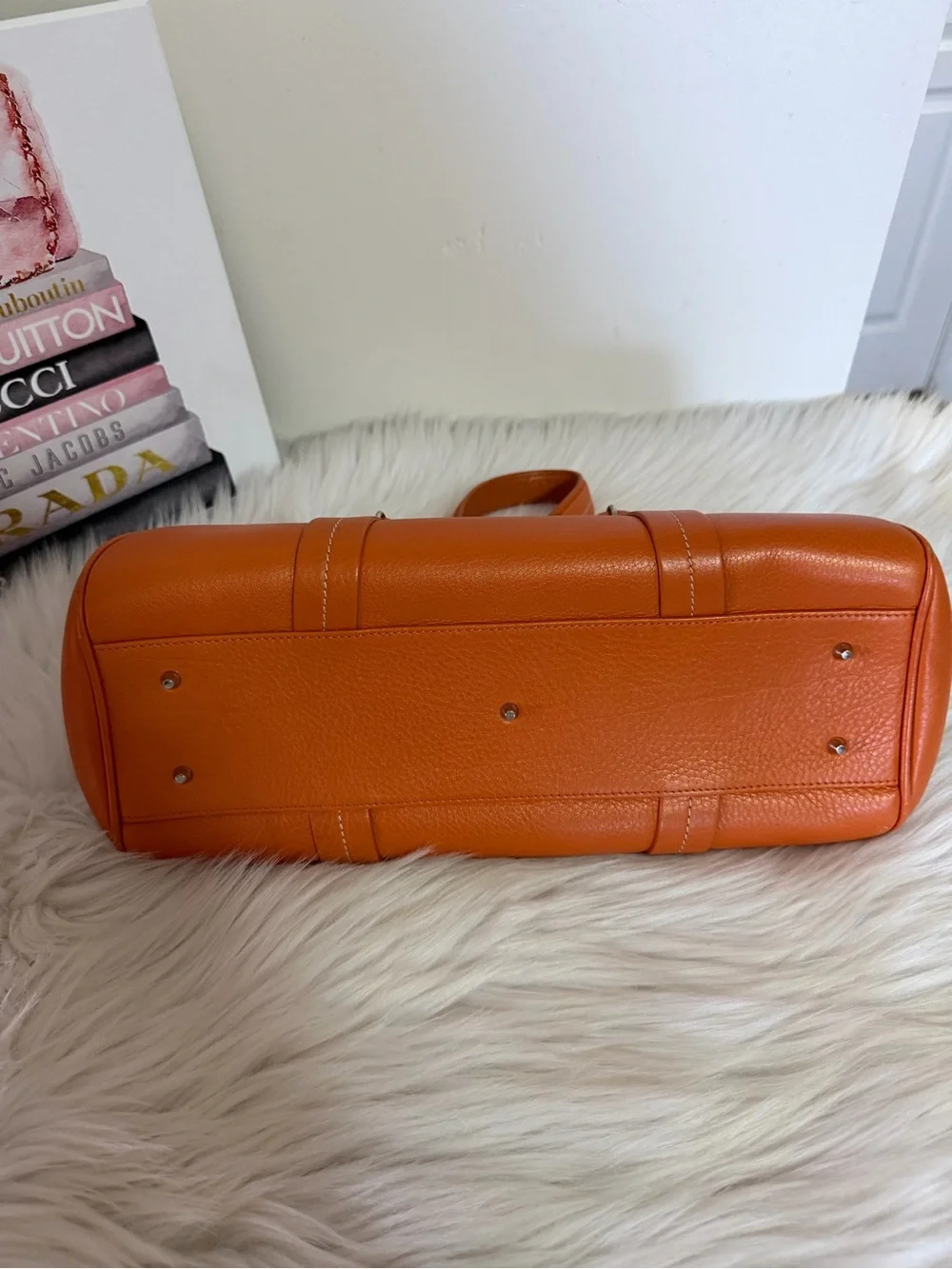 Dior Limited Edition Orange Leather Top-Handle Bag.